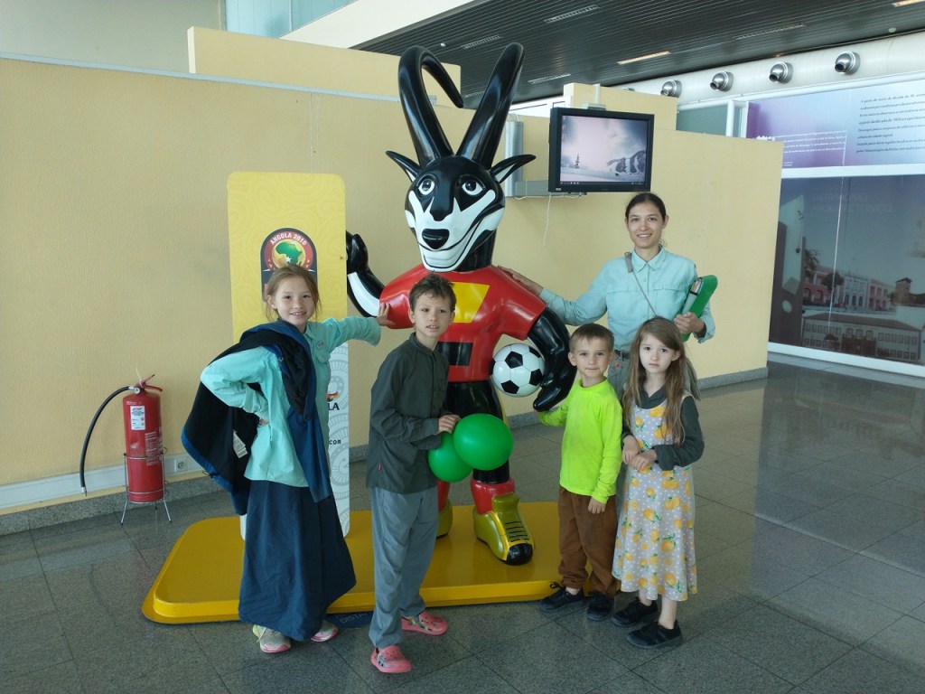 a family with a giant sable mascot